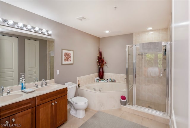 full bathroom with dual vanity, separate shower and tub, toilet, and tile floors