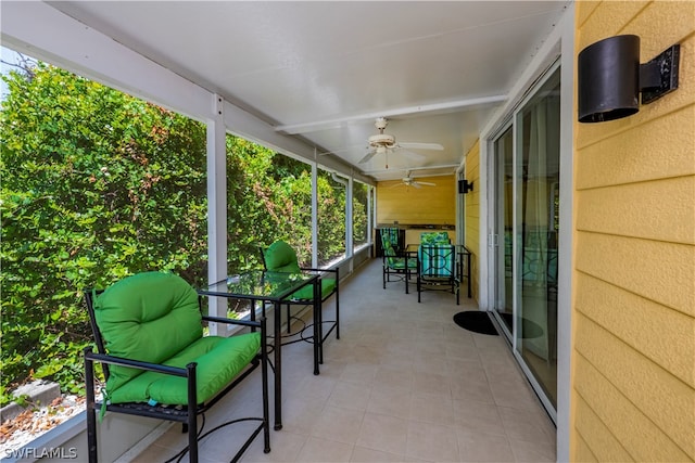 view of patio / terrace with ceiling fan and an outdoor living space