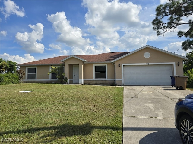 single story home featuring a garage, a front yard, driveway, and stucco siding