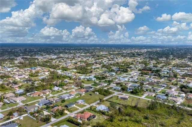 466 Redwing St, Lehigh Acres, FL 33974 - aerial view of property and surrounding area with nearby suburban area