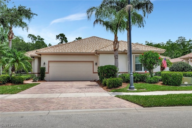 view of front of property featuring a garage