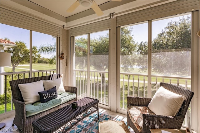 sunroom / solarium with ceiling fan