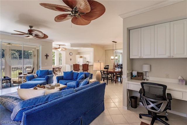 living room featuring crown molding, ceiling fan, and light tile floors