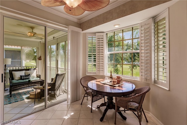 dining area with ceiling fan, a healthy amount of sunlight, and light tile floors