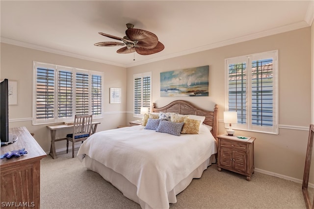 bedroom with ceiling fan, light carpet, and ornamental molding