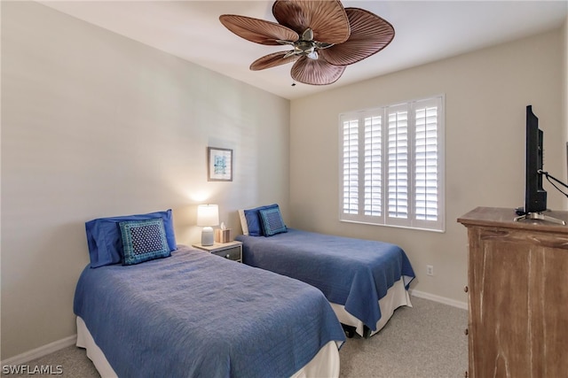 bedroom featuring ceiling fan and carpet floors