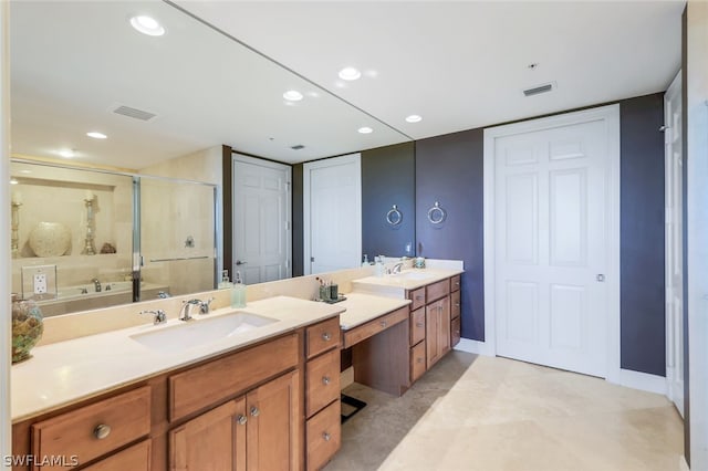 bathroom with shower with separate bathtub and vanity