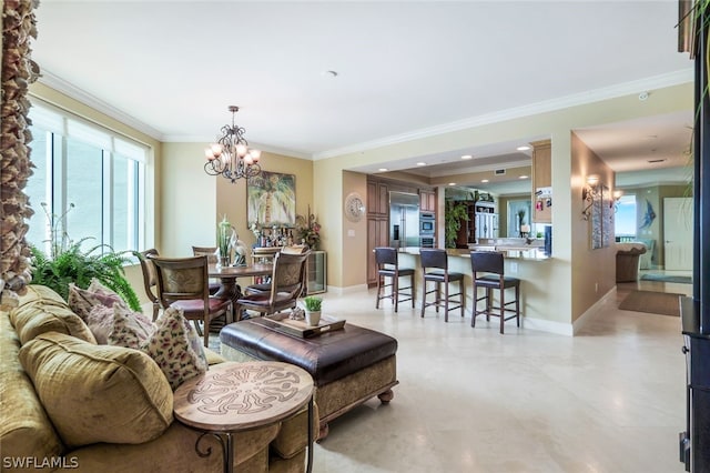 living room with crown molding and a chandelier