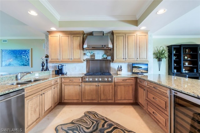 kitchen with wine cooler, stainless steel appliances, wall chimney exhaust hood, sink, and tasteful backsplash