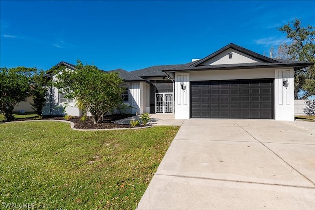 single story home with a garage and a front yard