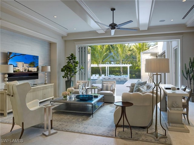 living room featuring ceiling fan, beam ceiling, crown molding, and radiator