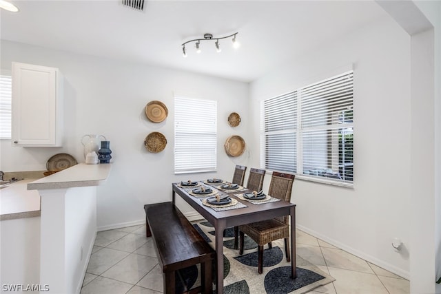 view of tiled dining space