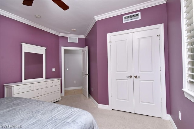 bedroom with light carpet, visible vents, and ornamental molding