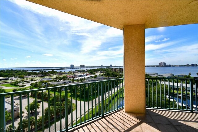 balcony featuring a water view