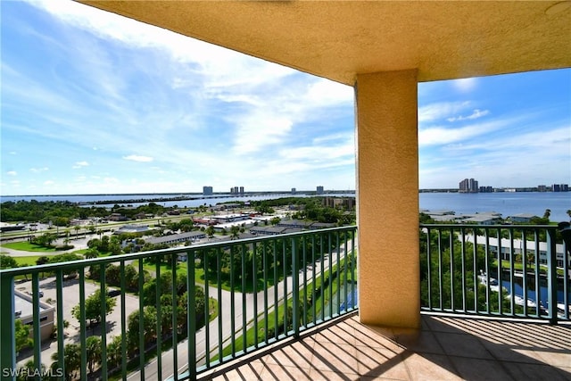 balcony with a city view and a water view