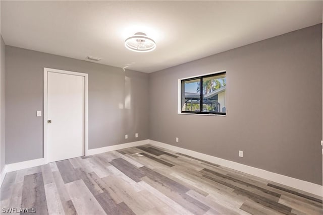 empty room featuring light hardwood / wood-style flooring