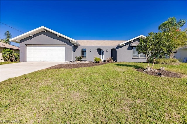 single story home featuring a front yard and a garage