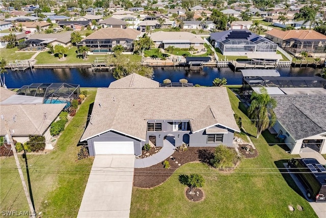 bird's eye view with a water view