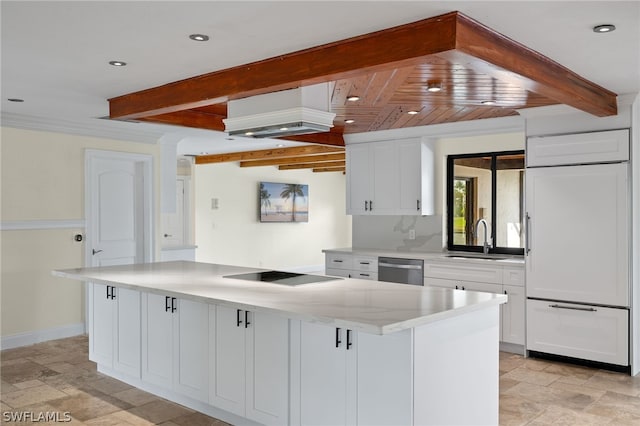 kitchen featuring a center island, white cabinetry, sink, and black electric cooktop