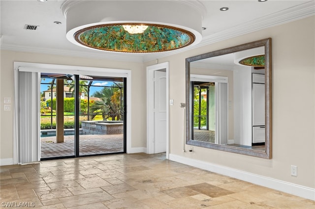 interior space featuring a wealth of natural light and crown molding