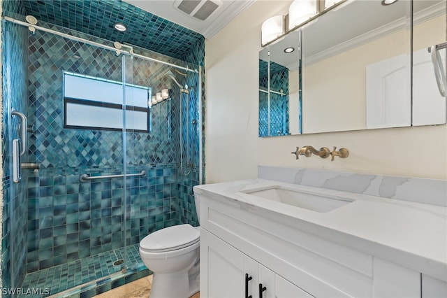 bathroom with crown molding, a shower with door, vanity, and toilet