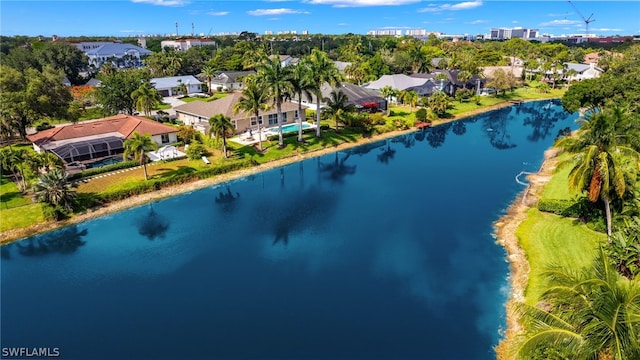 birds eye view of property featuring a water view