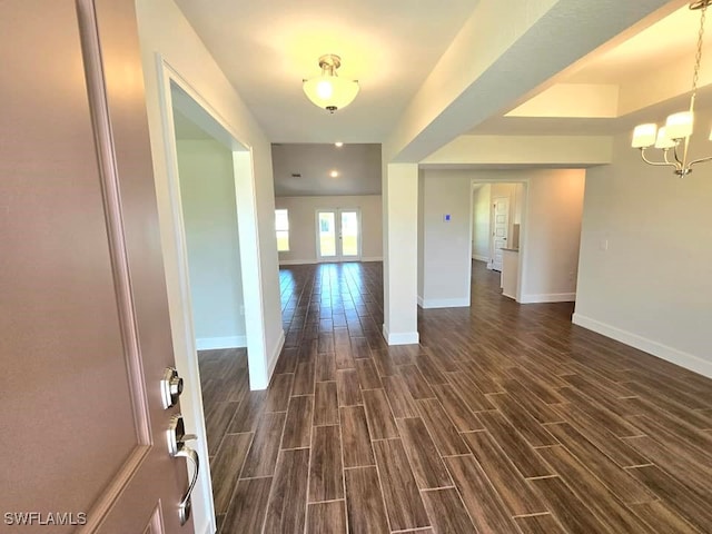 interior space with dark hardwood / wood-style floors