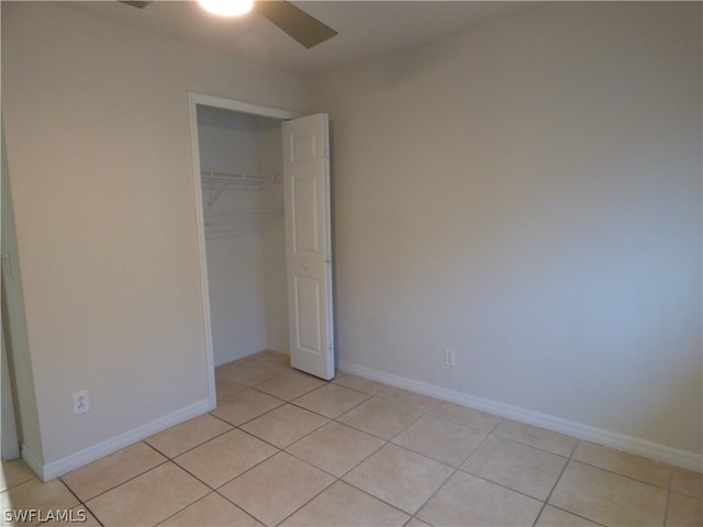 interior space featuring ceiling fan