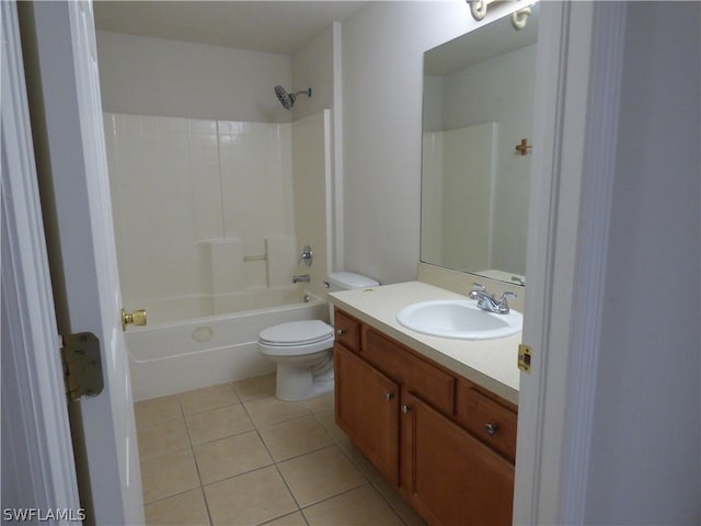 full bathroom featuring tile floors, vanity, toilet, and shower / bathing tub combination