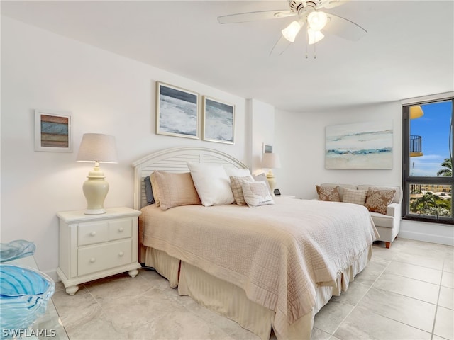 tiled bedroom with ceiling fan