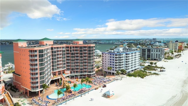 birds eye view of property with a water view