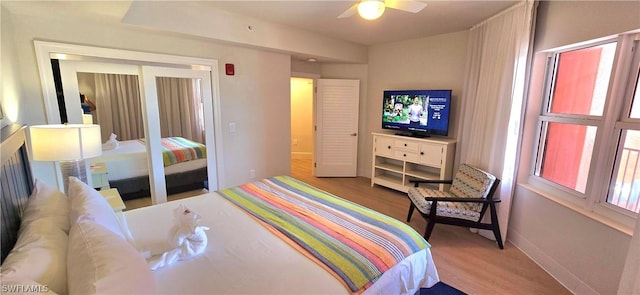 bedroom featuring hardwood / wood-style floors and ceiling fan