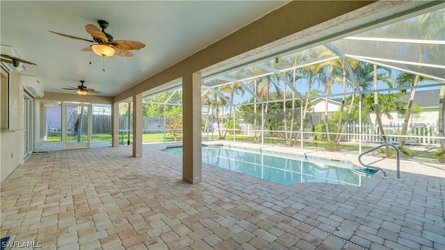 view of pool featuring a patio, a lanai, and ceiling fan