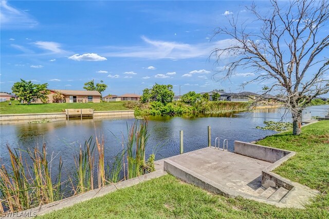 dock area featuring a water view