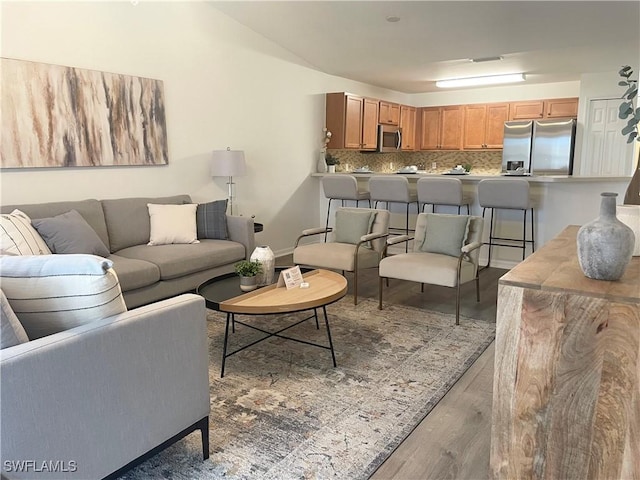 living room with light hardwood / wood-style flooring