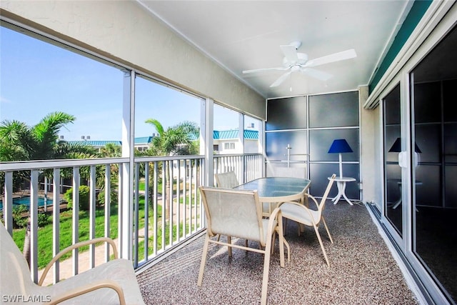 sunroom / solarium with ceiling fan and a wealth of natural light