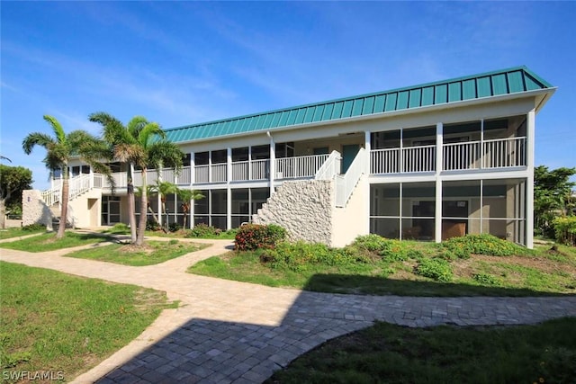 view of building exterior featuring stairs