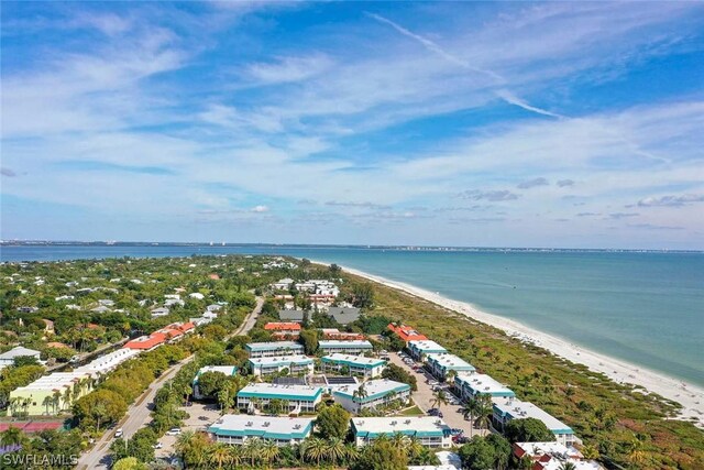 drone / aerial view with a view of the beach and a water view