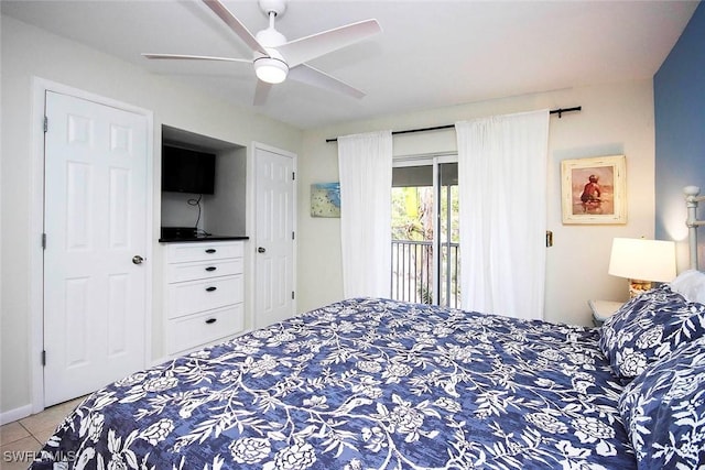 tiled bedroom featuring a ceiling fan and access to exterior