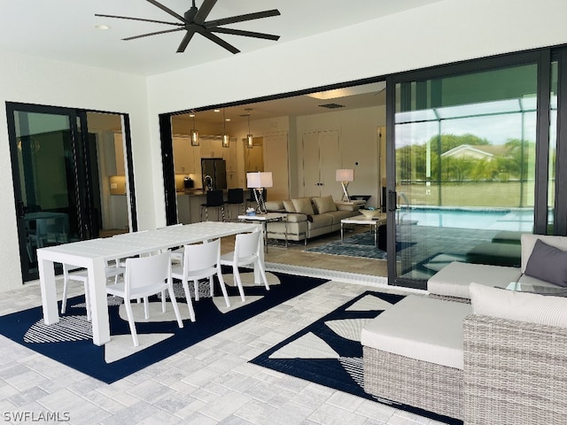 dining space with ceiling fan