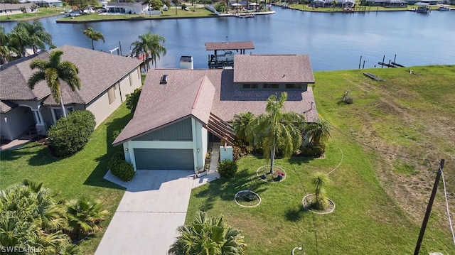 drone / aerial view featuring a water view