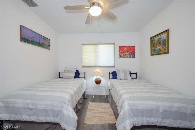 bedroom featuring ceiling fan and hardwood / wood-style floors