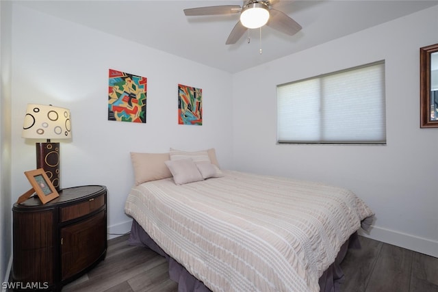 bedroom featuring dark hardwood / wood-style floors and ceiling fan