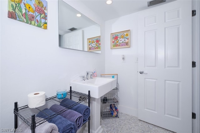 bedroom with tile patterned floors