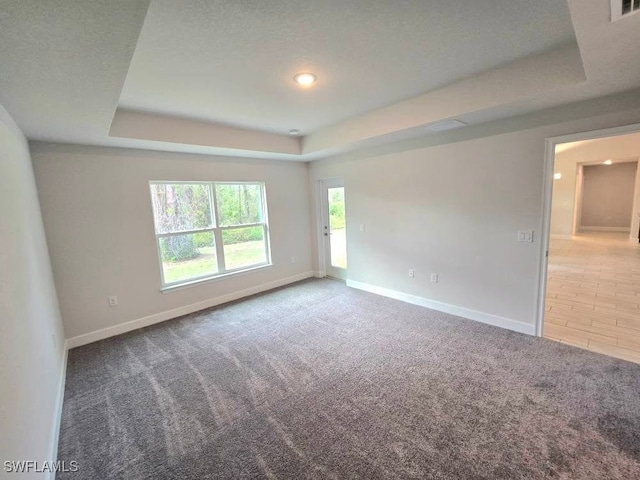 unfurnished room featuring carpet floors