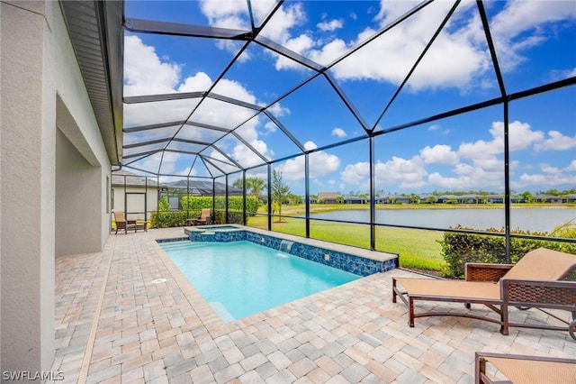 view of swimming pool featuring glass enclosure, a water view, a patio, and an in ground hot tub