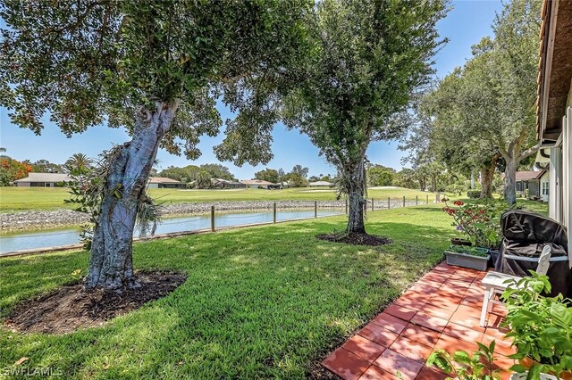 view of yard with a water view