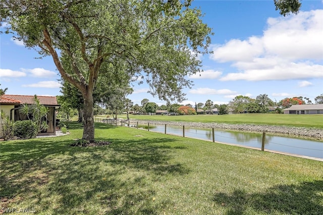 view of yard with a water view