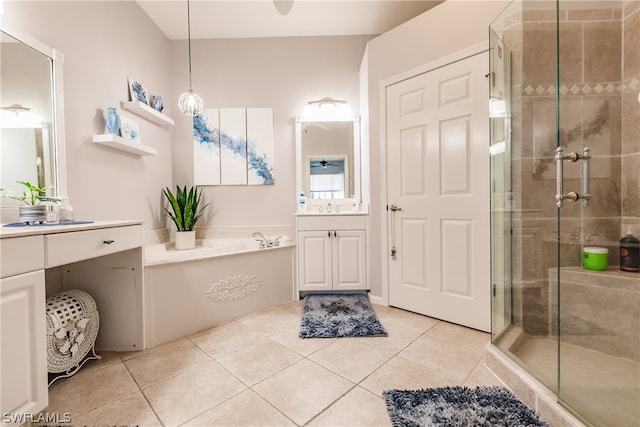 bathroom with tile flooring, independent shower and bath, and vanity