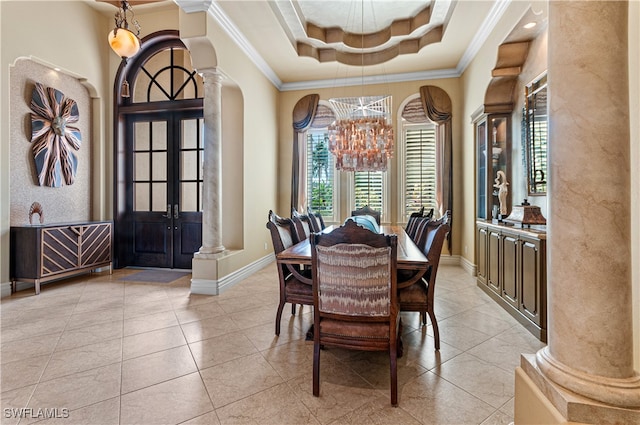 dining area with a chandelier, french doors, light tile patterned floors, and crown molding